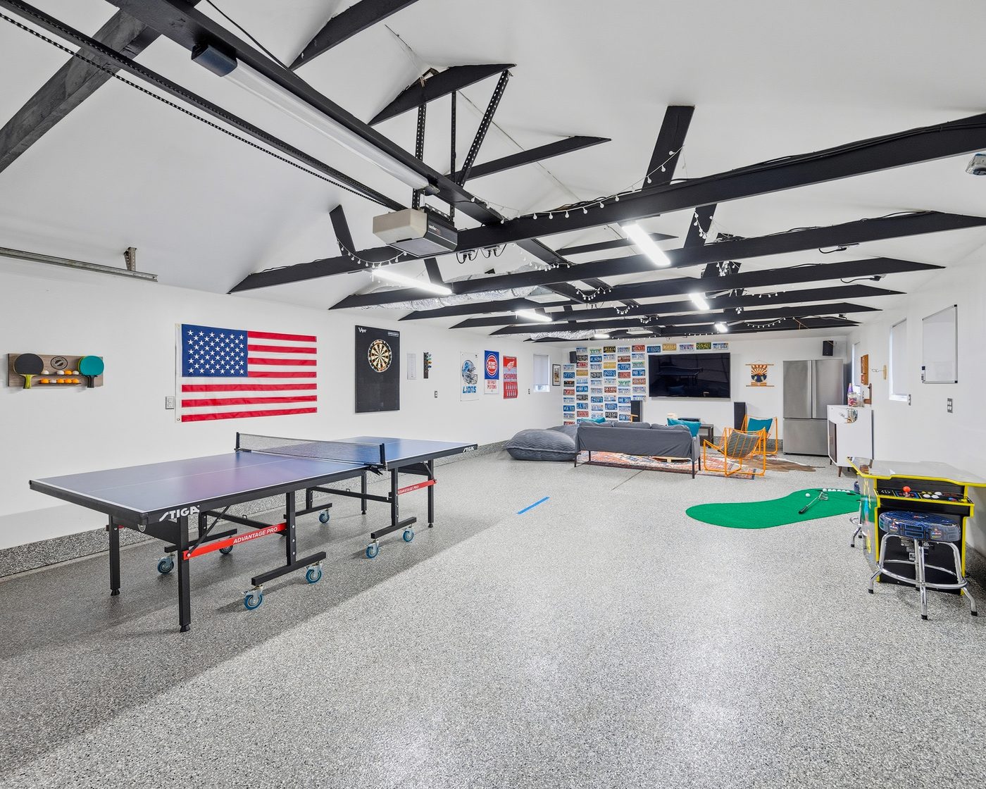 Guest-ready game room in a Black River managed home